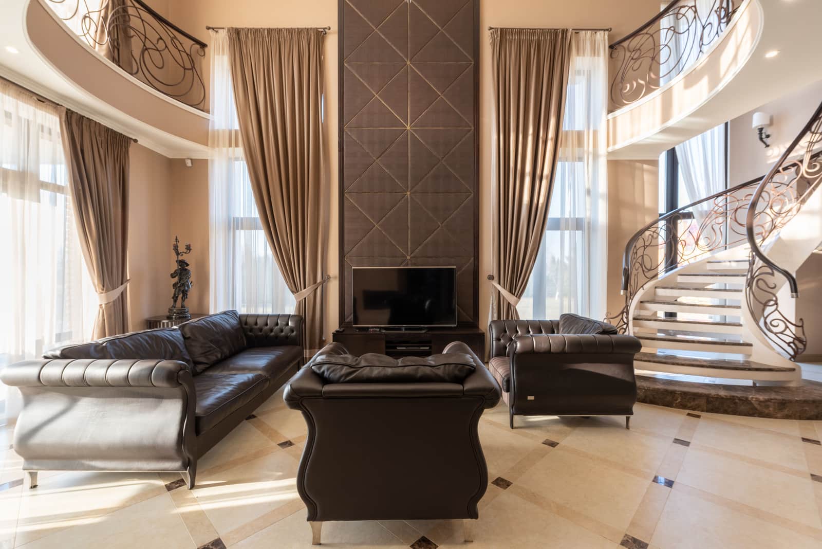 Floor-length lined drapes framing a living room window